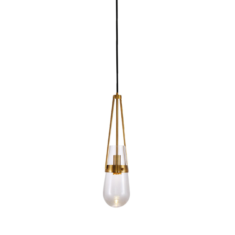 Drop Shaped Dining Room Hanging Lamp Clear/Blue Glass 1 Light Postmodern Pendulum Light with Gripper in Brass Clearhalo 'Ceiling Lights' 'Modern Pendants' 'Modern' 'Pendant Lights' 'Pendants' Lighting' 1937122