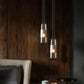 1 Bulb Bedroom Down Lighting Postmodern Black Hanging Pendant with Capsule Clear/Smoke/Amber Glass Shade Clearhalo 'Ceiling Lights' 'Glass shade' 'Glass' 'Modern Pendants' 'Modern' 'Pendant Lights' 'Pendants' Lighting' 1937232
