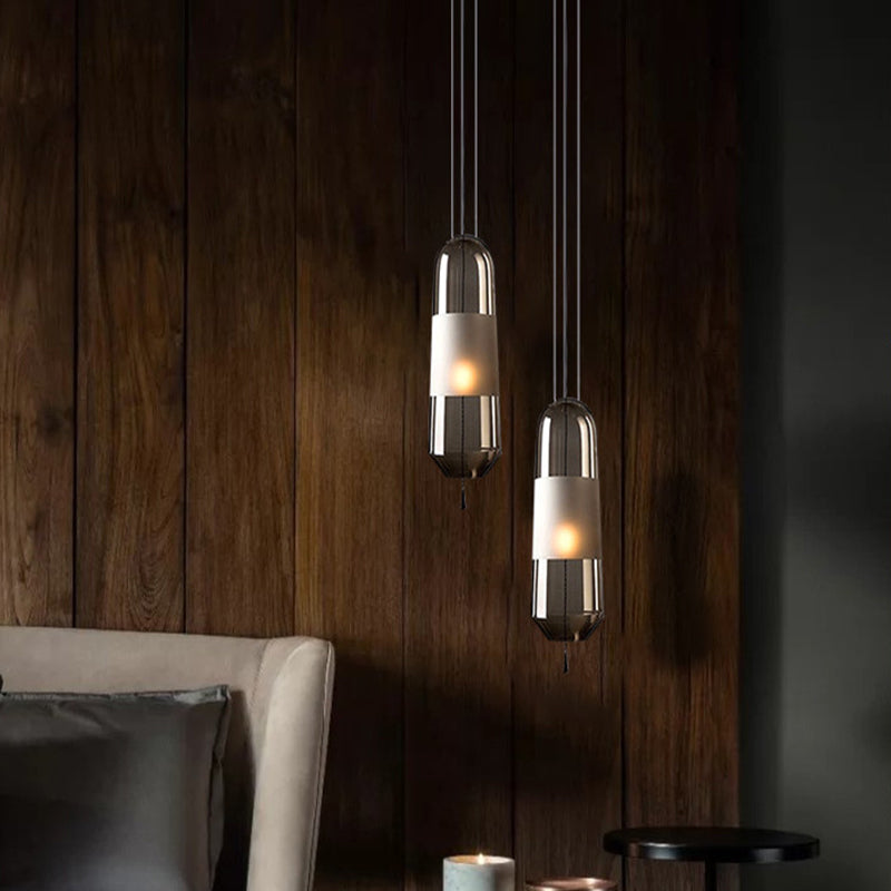 1 Bulb Bedroom Down Lighting Postmodern Black Hanging Pendant with Capsule Clear/Smoke/Amber Glass Shade Clearhalo 'Ceiling Lights' 'Glass shade' 'Glass' 'Modern Pendants' 'Modern' 'Pendant Lights' 'Pendants' Lighting' 1937232