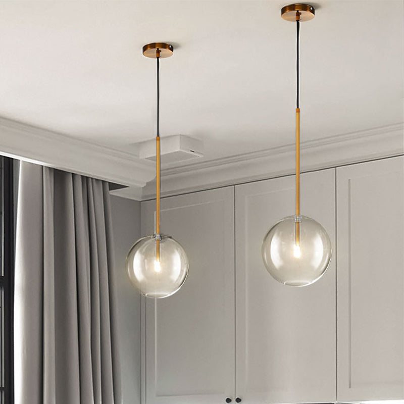 Clear Glass Globe Suspension Lighting Minimalist 6"/8"/10" Wide Single Gold Hanging Pendant over Table Clearhalo 'Ceiling Lights' 'Glass shade' 'Glass' 'Modern Pendants' 'Modern' 'Pendant Lights' 'Pendants' Lighting' 1937392