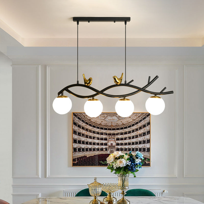 Linear/Branch Dining Room Island Lamp Cream Ball Glass 4 Heads Contemporary Hanging Pendant with Bird Deco in Black-Gold Black A Clearhalo 'Ceiling Lights' 'Glass shade' 'Glass' 'Island Lights' Lighting' 1937631