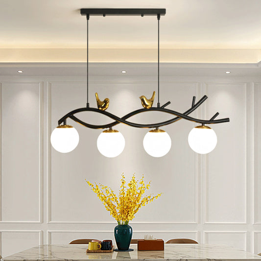 Linear/Branch Dining Room Island Lamp Cream Ball Glass 4 Heads Contemporary Hanging Pendant with Bird Deco in Black-Gold Clearhalo 'Ceiling Lights' 'Glass shade' 'Glass' 'Island Lights' Lighting' 1937632