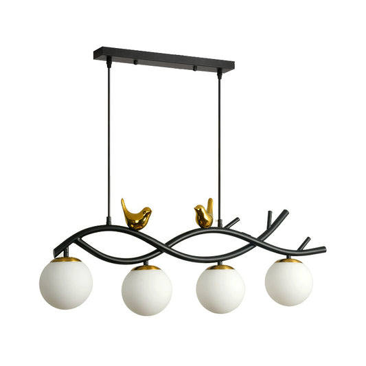 Linear/Branch Dining Room Island Lamp Cream Ball Glass 4 Heads Contemporary Hanging Pendant with Bird Deco in Black-Gold Clearhalo 'Ceiling Lights' 'Glass shade' 'Glass' 'Island Lights' Lighting' 1937634