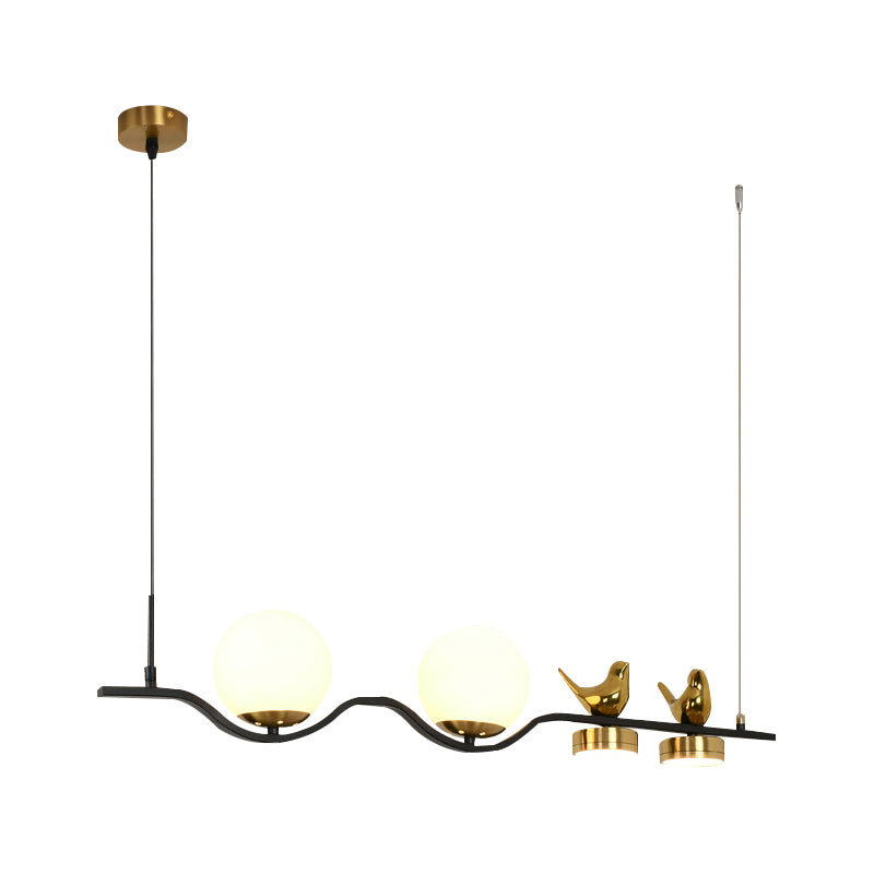 Linear/Branch Dining Room Island Lamp Cream Ball Glass 4 Heads Contemporary Hanging Pendant with Bird Deco in Black-Gold Clearhalo 'Ceiling Lights' 'Glass shade' 'Glass' 'Island Lights' Lighting' 1937639