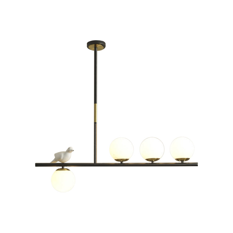 Linear/Branch Dining Room Island Lamp Cream Ball Glass 4 Heads Contemporary Hanging Pendant with Bird Deco in Black-Gold Clearhalo 'Ceiling Lights' 'Glass shade' 'Glass' 'Island Lights' Lighting' 1937642