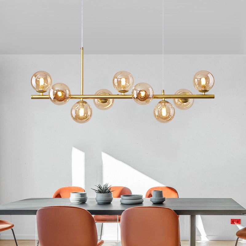 Clear/Amber/Smoke Grey Glass Ball Pendant Postmodern 7/9/11 Lights Black/Gold Hanging Island Light for Kitchen 9 Gold Clearhalo 'Ceiling Lights' 'Glass shade' 'Glass' 'Island Lights' Lighting' 1937645