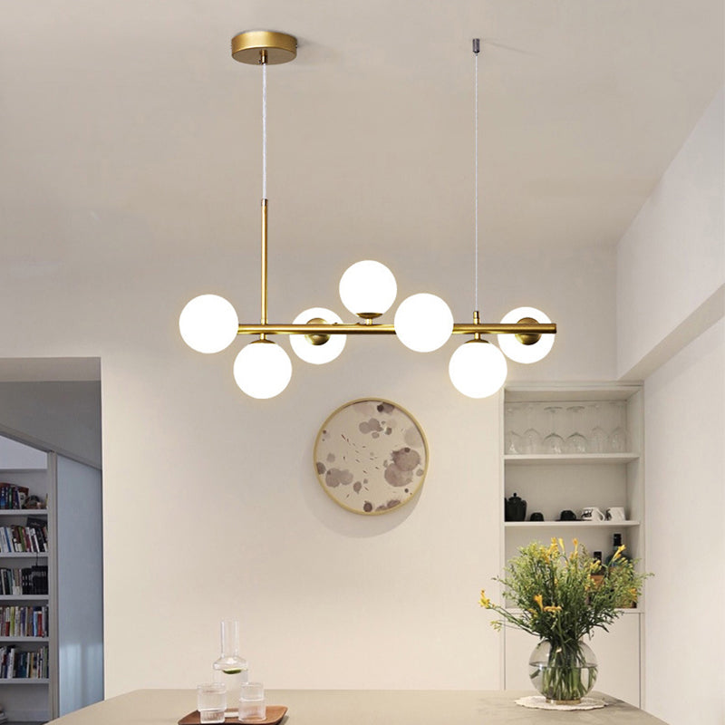 Clear/Amber/Smoke Grey Glass Ball Pendant Postmodern 7/9/11 Lights Black/Gold Hanging Island Light for Kitchen 7 Gold Clearhalo 'Ceiling Lights' 'Glass shade' 'Glass' 'Island Lights' Lighting' 1937658