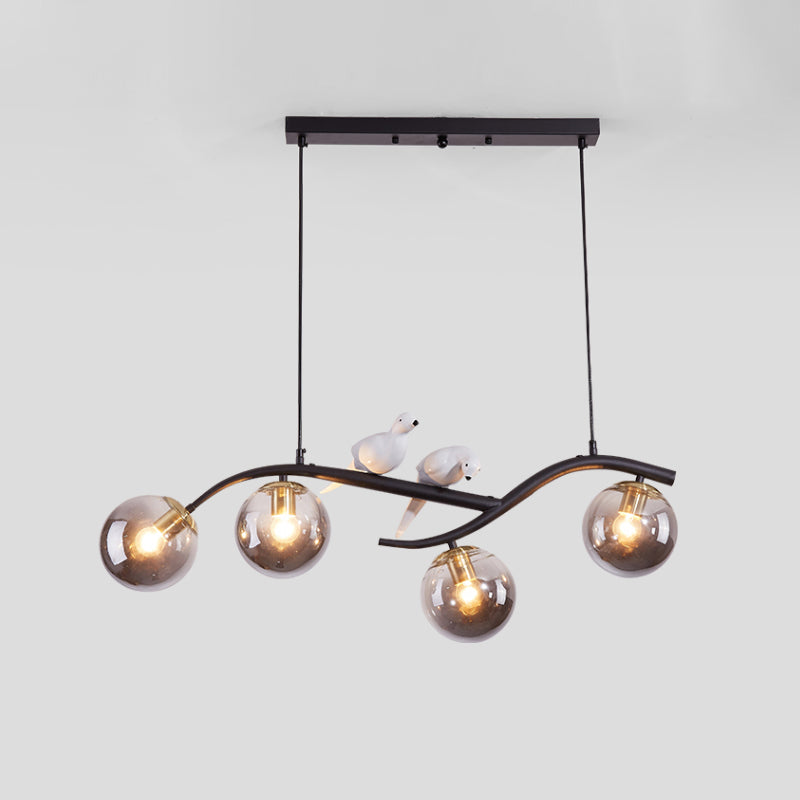 Metal Branch Hanging Lamp Contemporary 4-Light Black/Gold Island Pendant with Bird Deco and Smoke Grey/Cognac Glass Shade Clearhalo 'Ceiling Lights' 'Glass shade' 'Glass' 'Island Lights' Lighting' 1937730