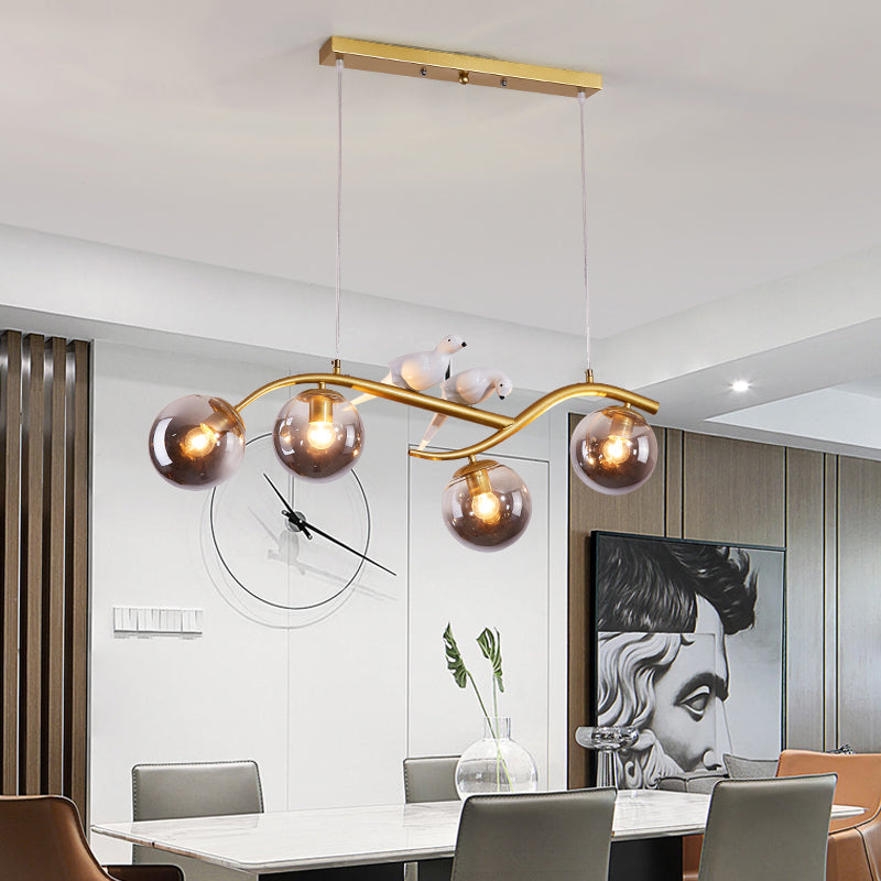 Metal Branch Hanging Lamp Contemporary 4-Light Black/Gold Island Pendant with Bird Deco and Smoke Grey/Cognac Glass Shade Gold Smoke Grey Clearhalo 'Ceiling Lights' 'Glass shade' 'Glass' 'Island Lights' Lighting' 1937736