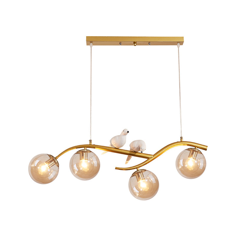 Metal Branch Hanging Lamp Contemporary 4-Light Black/Gold Island Pendant with Bird Deco and Smoke Grey/Cognac Glass Shade Clearhalo 'Ceiling Lights' 'Glass shade' 'Glass' 'Island Lights' Lighting' 1937742