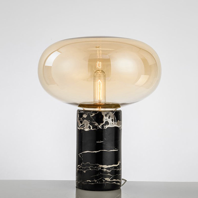 Ellipse Smoke Grey/Amber Glass Table Lamp Post-Modern 1-Light Black Nightstand Light with Cylindrical Marble Base Clearhalo 'Lamps' 'Table Lamps' Lighting' 1937811