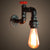 Black Faucet Wall Mount Lamp Steampunk Iron 1-Light Living Room Wall Light Kit with Red Valve Black Clearhalo 'Art deco wall lights' 'Cast Iron' 'Glass' 'Industrial wall lights' 'Industrial' 'Middle century wall lights' 'Modern' 'Rustic wall lights' 'Tiffany' 'Traditional wall lights' 'Wall Lamps & Sconces' 'Wall Lights' Lighting' 1948838