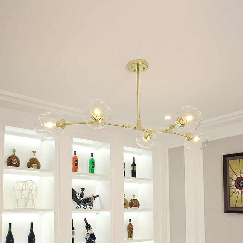 Gold Molecule Hanging Chandelier Postmodern 5/7-Light Metal Ceiling Pendant with Dimpled Cup Clear Glass Shade 5 Gold Clearhalo 'Ceiling Lights' 'Chandeliers' 'Modern Chandeliers' 'Modern' Lighting' 1949692
