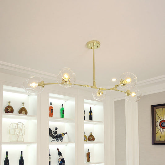 Gold Molecule Hanging Chandelier Postmodern 5/7-Light Metal Ceiling Pendant with Dimpled Cup Clear Glass Shade 5 Gold Clearhalo 'Ceiling Lights' 'Chandeliers' 'Modern Chandeliers' 'Modern' Lighting' 1949692