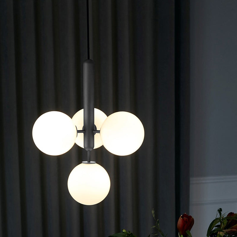 Orb Shaped Bar Ceiling Pendant Ivory Glass 4 Heads Simple Style Chandelier Light in Black Black Clearhalo 'Ceiling Lights' 'Chandeliers' 'Modern Chandeliers' 'Modern' Lighting' 1949706