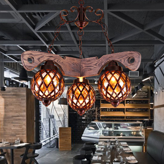 Country Style Globe Chandelier with Amber Glass Adjustable 3/5 Heads Hanging Pendant Light in Black 3 Black Clearhalo 'Ceiling Lights' 'Chandeliers' 'Glass shade' 'Glass' 'Industrial Chandeliers' 'Industrial' 'Middle Century Chandeliers' 'Tiffany' Lighting' 1950136
