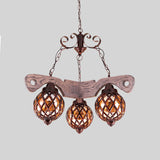 Country Style Globe Chandelier with Amber Glass Adjustable 3/5 Heads Hanging Pendant Light in Black Clearhalo 'Ceiling Lights' 'Chandeliers' 'Glass shade' 'Glass' 'Industrial Chandeliers' 'Industrial' 'Middle Century Chandeliers' 'Tiffany' Lighting' 1950138