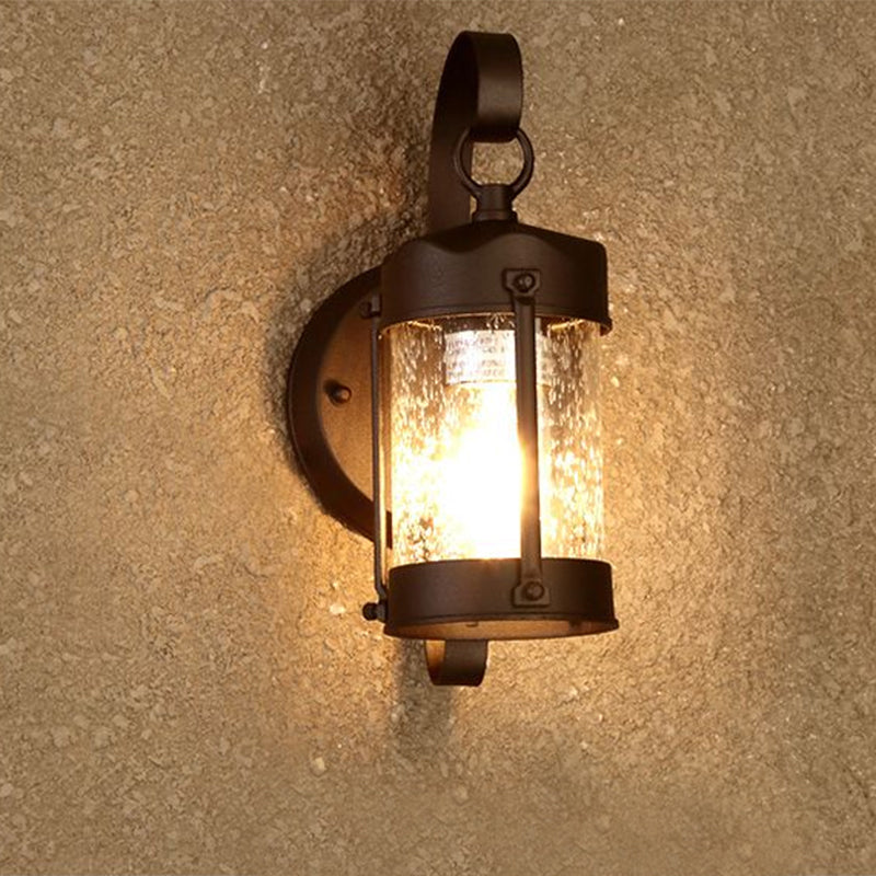 One Bulb Wall Light with Cylinder/Lantern Shade Bubble Glass Industrial Porch Sconce Lighting Fixture in Black Clearhalo 'Art deco wall lights' 'Cast Iron' 'Glass' 'Industrial wall lights' 'Industrial' 'Middle century wall lights' 'Modern' 'Rustic wall lights' 'Tiffany' 'Traditional wall lights' 'Wall Lamps & Sconces' 'Wall Lights' Lighting' 1959447