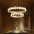 Postmodern Wreath Shaped Ceiling Pendant Crystal Dining Room Small/Large LED Chandelier in Gold, Warm/White Light Gold Clearhalo 'Ceiling Lights' 'Chandeliers' 'Modern Chandeliers' 'Modern' Lighting' 1969453