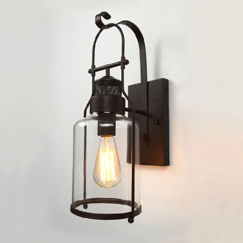 Cylindrical Clear Glass Wall Hanging Light Rustic 1 Head Kitchen Wall Mounted Lamp with Mesh Top in Black Black Clearhalo 'Art deco wall lights' 'Cast Iron' 'Glass' 'Industrial wall lights' 'Industrial' 'Middle century wall lights' 'Modern' 'Rustic wall lights' 'Tiffany' 'Traditional wall lights' 'Wall Lamps & Sconces' 'Wall Lights' Lighting' 1969627