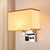 White/Flaxen Cuboid Wall Lamp Fixture Simplicity Single Fabric Sconce Light with Wall Socket and USB Port Flaxen Clearhalo 'Cast Iron' 'Glass' 'Industrial' 'Modern wall lights' 'Modern' 'Tiffany' 'Traditional wall lights' 'Wall Lamps & Sconces' 'Wall Lights' Lighting' 1982873