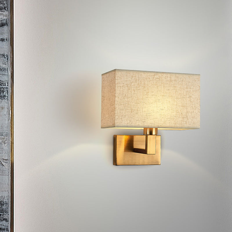 Postmodern Cuboid Sconce Lamp Fabric 1-Light Bedside Reading Wall Light in White/Beige/Brown with Black/Gold Arm Gold Beige Clearhalo 'Cast Iron' 'Glass' 'Industrial' 'Modern wall lights' 'Modern' 'Tiffany' 'Traditional wall lights' 'Wall Lamps & Sconces' 'Wall Lights' Lighting' 1982886
