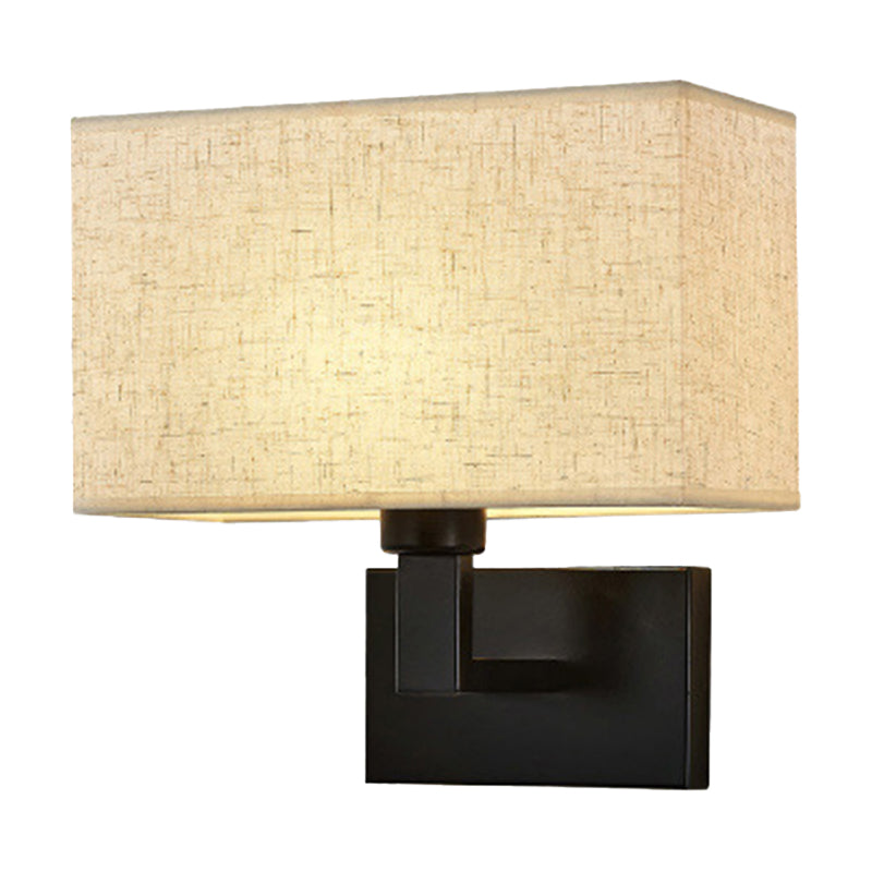 Postmodern Cuboid Sconce Lamp Fabric 1-Light Bedside Reading Wall Light in White/Beige/Brown with Black/Gold Arm Black Beige Clearhalo 'Cast Iron' 'Glass' 'Industrial' 'Modern wall lights' 'Modern' 'Tiffany' 'Traditional wall lights' 'Wall Lamps & Sconces' 'Wall Lights' Lighting' 1982896