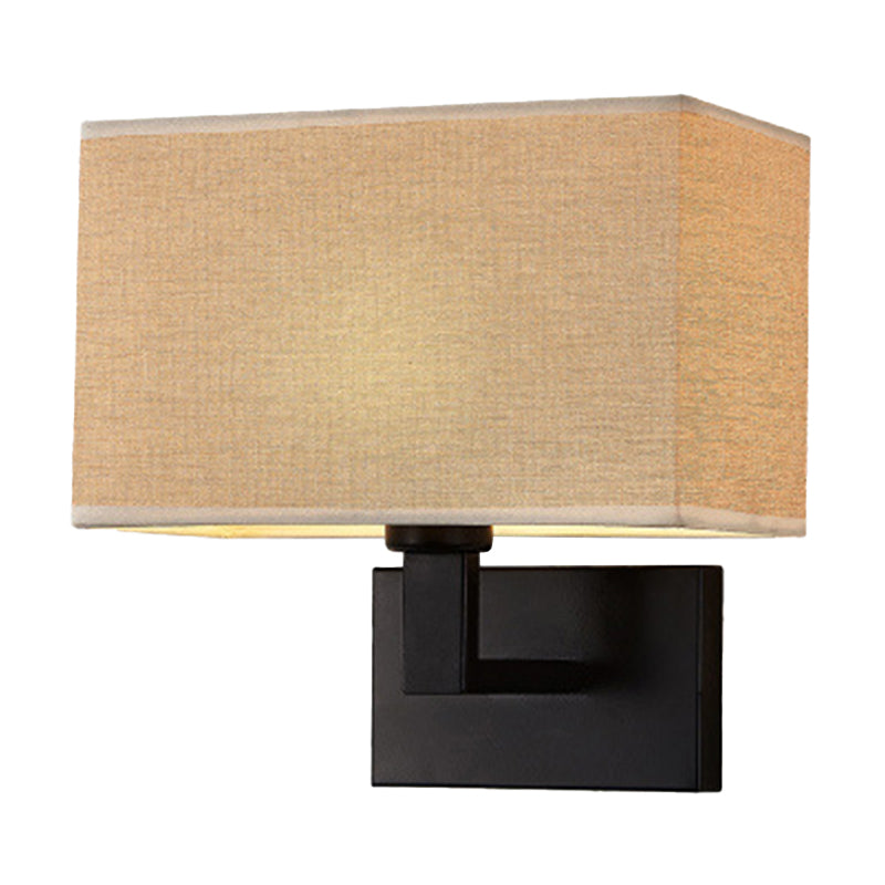 Postmodern Cuboid Sconce Lamp Fabric 1-Light Bedside Reading Wall Light in White/Beige/Brown with Black/Gold Arm Black Brown Clearhalo 'Cast Iron' 'Glass' 'Industrial' 'Modern wall lights' 'Modern' 'Tiffany' 'Traditional wall lights' 'Wall Lamps & Sconces' 'Wall Lights' Lighting' 1982898