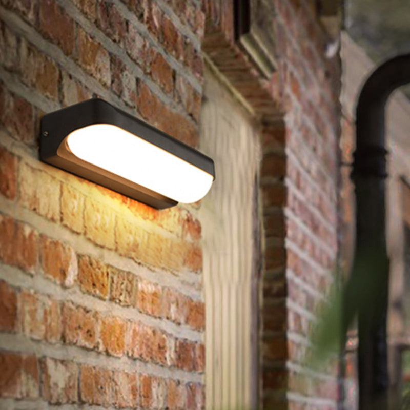 Capsule Flush Wall Sconce Modern Acrylic 1/2-Bulb Doorway Wall Mounted Lamp in Black Black A Clearhalo 'Cast Iron' 'Glass' 'Industrial' 'Modern wall lights' 'Modern' 'Tiffany' 'Traditional wall lights' 'Wall Lamps & Sconces' 'Wall Lights' Lighting' 1985262