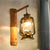1-Head Wall Light Sconce Coastal Lantern Clear Glass Wall Mount Lighting with Bamboo Backplate Antique Brass Clearhalo 'Art deco wall lights' 'Cast Iron' 'Glass' 'Industrial wall lights' 'Industrial' 'Middle century wall lights' 'Modern' 'Rustic wall lights' 'Tiffany' 'Traditional wall lights' 'Wall Lamps & Sconces' 'Wall Lights' Lighting' 2011511