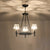 Faceted Crystal Hanging Lamp Kit Classic Conic Living Room Chandelier Lighting with Metal Ring Design 3 Black Clearhalo 'Ceiling Lights' 'Chandeliers' Lighting' options 2017260_376c10b3-382c-49b4-a8f6-8d4e2530c87e