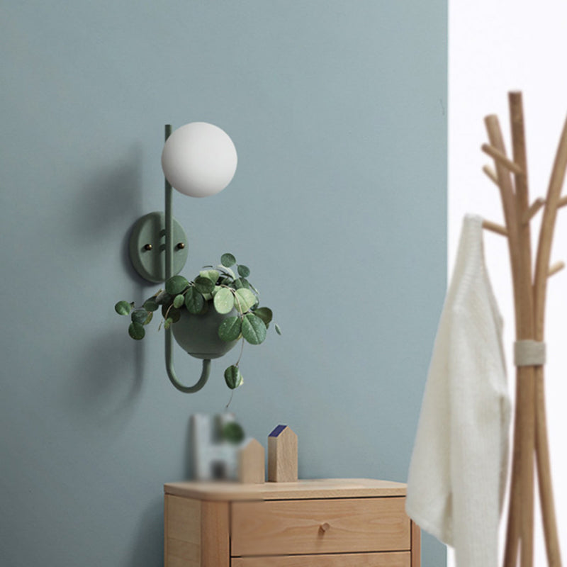 Macaron Sphere Wall Lighting Opal Glass 1 Bulb Bedroom Sconce Light with Metal Dome Pot Green Clearhalo 'Cast Iron' 'Glass' 'Industrial' 'Modern wall lights' 'Modern' 'Tiffany' 'Traditional wall lights' 'Wall Lamps & Sconces' 'Wall Lights' Lighting' 2024505