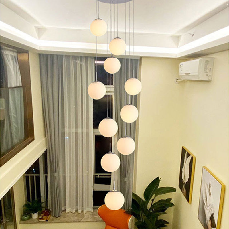 10 Heads Stairs Cluster Pendant Light Simple Silver Drop Lamp with Spherical Cream Glass Shade Clearhalo 'Ceiling Lights' 'Modern Pendants' 'Modern' 'Pendant Lights' 'Pendants' Lighting' 2025383