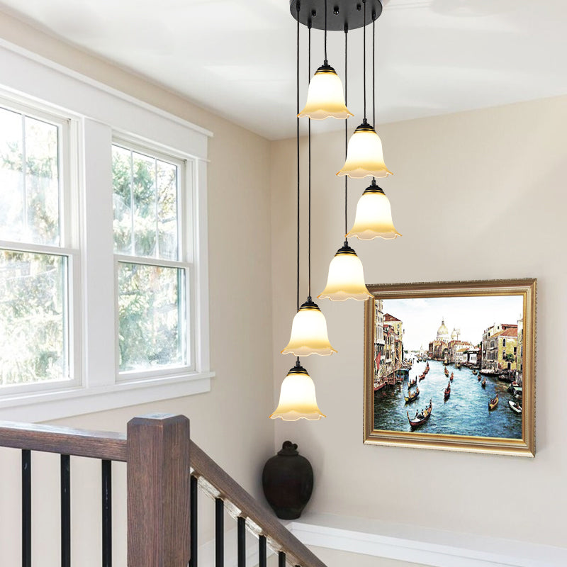Flower Stairs Multi Pendant Light Frosted Glass Minimalist Suspension Lighting in Black with Round Canopy 6 Black Round Clearhalo 'Ceiling Lights' 'Modern Pendants' 'Modern' 'Pendant Lights' 'Pendants' Lighting' 2025563