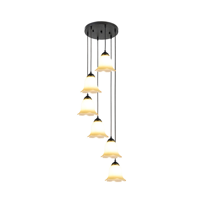 Flower Stairs Multi Pendant Light Frosted Glass Minimalist Suspension Lighting in Black with Round Canopy Clearhalo 'Ceiling Lights' 'Modern Pendants' 'Modern' 'Pendant Lights' 'Pendants' Lighting' 2025565