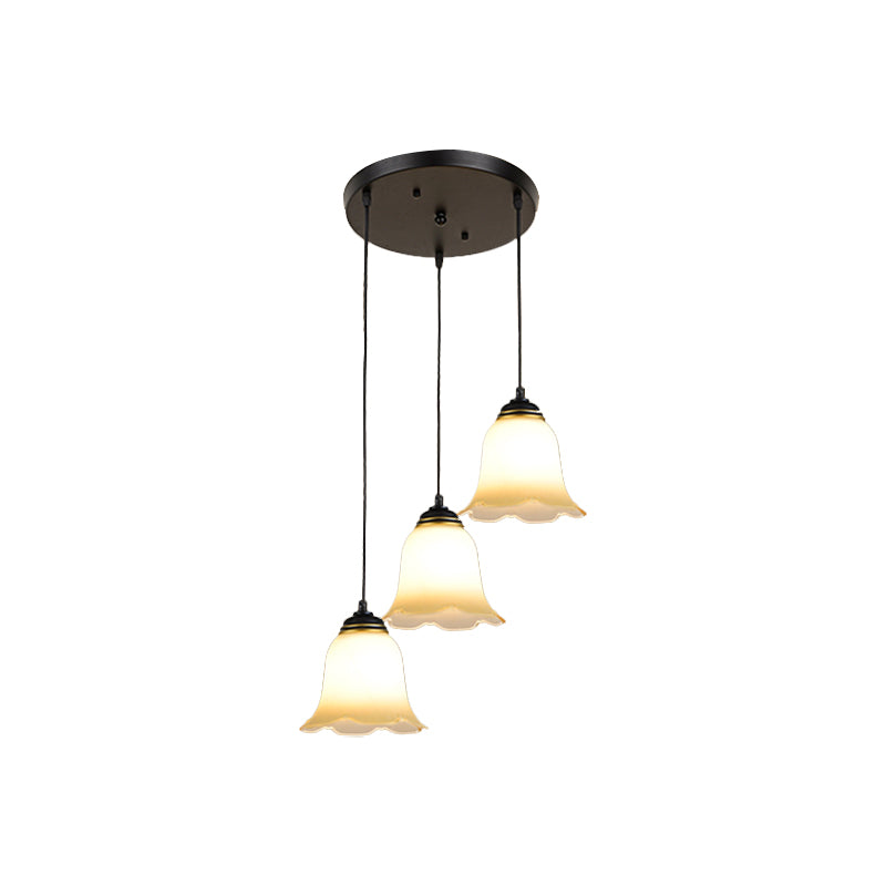 Flower Stairs Multi Pendant Light Frosted Glass Minimalist Suspension Lighting in Black with Round Canopy 3 Black Round Clearhalo 'Ceiling Lights' 'Modern Pendants' 'Modern' 'Pendant Lights' 'Pendants' Lighting' 2025573