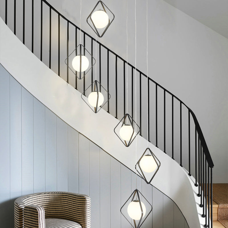 Simple Multi Light Pendant Global Metallic Pendulum Lamp with Opal Glass Shade for Living Room 6 Black Round Clearhalo 'Ceiling Lights' 'Modern Pendants' 'Modern' 'Pendant Lights' 'Pendants' Lighting' 2025622