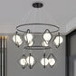 Simple Multi Light Pendant Global Metallic Pendulum Lamp with Opal Glass Shade for Living Room Clearhalo 'Ceiling Lights' 'Modern Pendants' 'Modern' 'Pendant Lights' 'Pendants' Lighting' 2025637