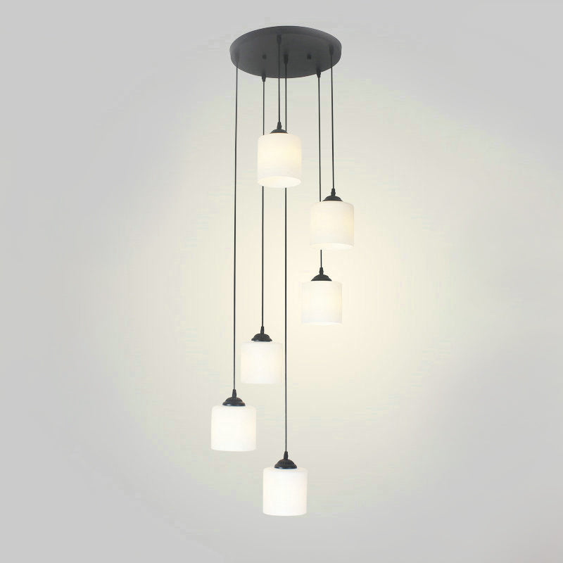 Modernism Cylinder Cluster Pendant Opal Glass Stairs Pendulum Light in Black with Round Canopy Clearhalo 'Ceiling Lights' 'Modern Pendants' 'Modern' 'Pendant Lights' 'Pendants' Lighting' 2025671