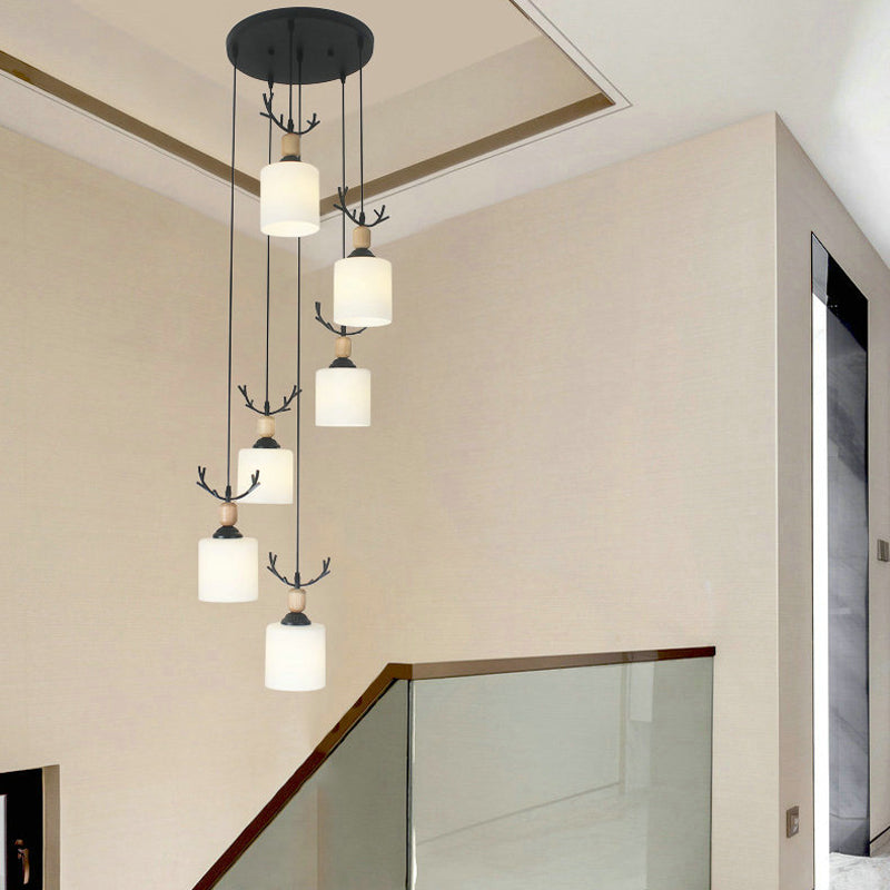 Modernism Cylinder Cluster Pendant Opal Glass Stairs Pendulum Light in Black with Round Canopy Clearhalo 'Ceiling Lights' 'Modern Pendants' 'Modern' 'Pendant Lights' 'Pendants' Lighting' 2025674