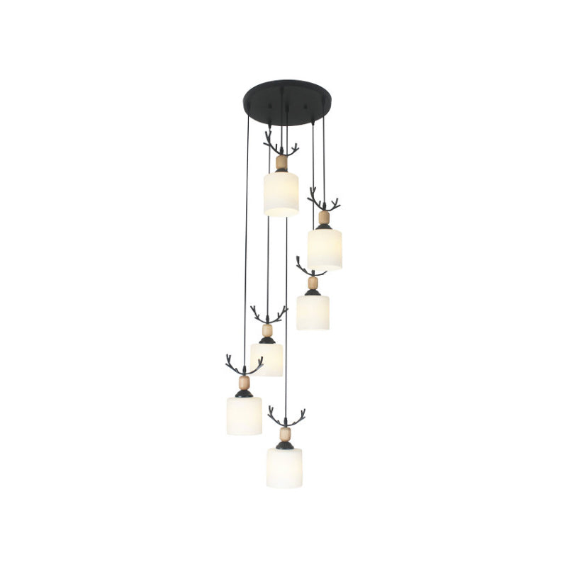 Modernism Cylinder Cluster Pendant Opal Glass Stairs Pendulum Light in Black with Round Canopy Clearhalo 'Ceiling Lights' 'Modern Pendants' 'Modern' 'Pendant Lights' 'Pendants' Lighting' 2025675