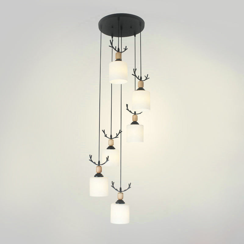 Modernism Cylinder Cluster Pendant Opal Glass Stairs Pendulum Light in Black with Round Canopy Clearhalo 'Ceiling Lights' 'Modern Pendants' 'Modern' 'Pendant Lights' 'Pendants' Lighting' 2025676