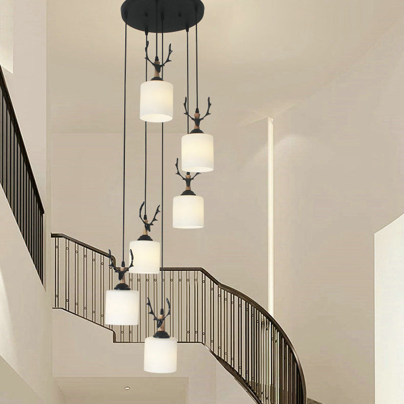 Modernism Cylinder Cluster Pendant Opal Glass Stairs Pendulum Light in Black with Round Canopy Clearhalo 'Ceiling Lights' 'Modern Pendants' 'Modern' 'Pendant Lights' 'Pendants' Lighting' 2025679