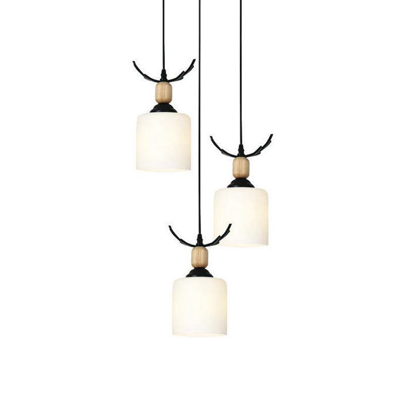 Modernism Cylinder Cluster Pendant Opal Glass Stairs Pendulum Light in Black with Round Canopy 3 White B Clearhalo 'Ceiling Lights' 'Modern Pendants' 'Modern' 'Pendant Lights' 'Pendants' Lighting' 2025685