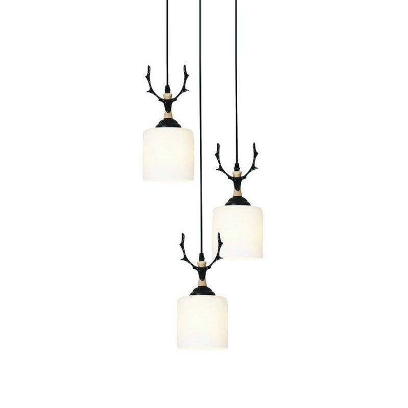 Modernism Cylinder Cluster Pendant Opal Glass Stairs Pendulum Light in Black with Round Canopy 3 White C Clearhalo 'Ceiling Lights' 'Modern Pendants' 'Modern' 'Pendant Lights' 'Pendants' Lighting' 2025687