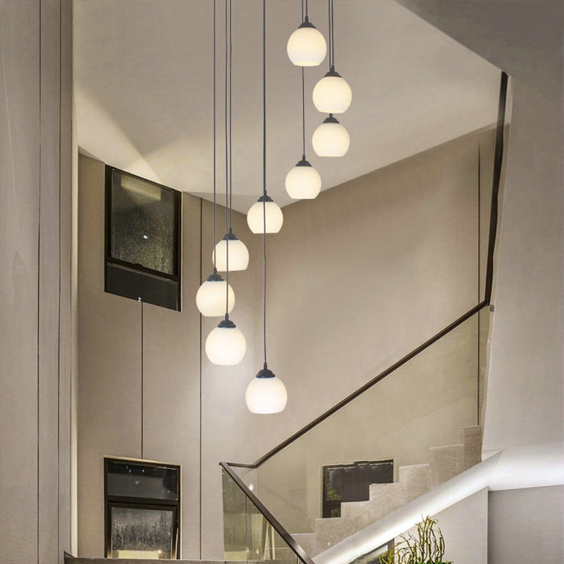 Milky Glass Global Spiral Multi Pendant Simple Hanging Ceiling Light in Black for Stairs 9 White A Clearhalo 'Ceiling Lights' 'Modern Pendants' 'Modern' 'Pendant Lights' 'Pendants' Lighting' 2025694
