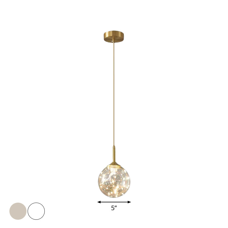 Modern Sphere Ceiling Pendant Glass Dining Room LED Suspension Lamp in Brass Clearhalo 'Ceiling Lights' 'Modern Pendants' 'Modern' 'Pendant Lights' 'Pendants' Lighting' 2025839