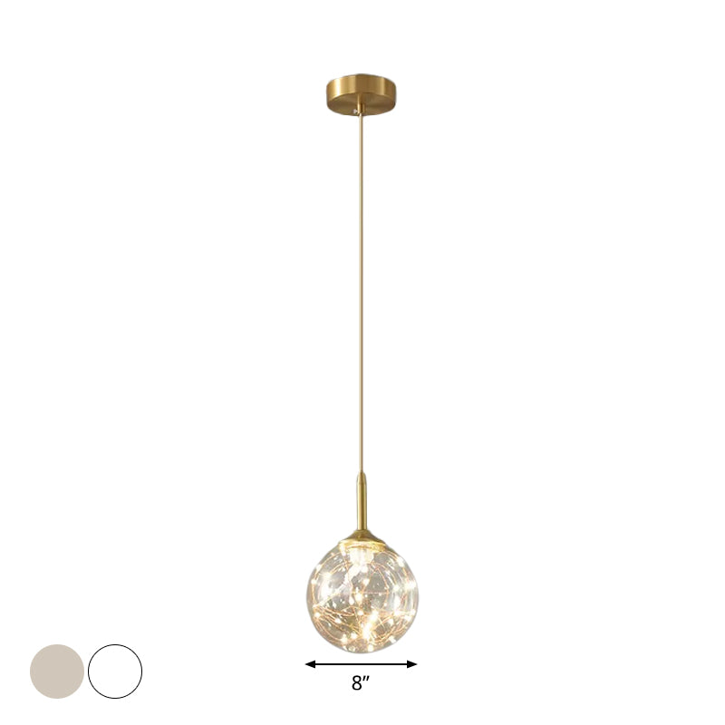 Modern Sphere Ceiling Pendant Glass Dining Room LED Suspension Lamp in Brass Clearhalo 'Ceiling Lights' 'Modern Pendants' 'Modern' 'Pendant Lights' 'Pendants' Lighting' 2025840