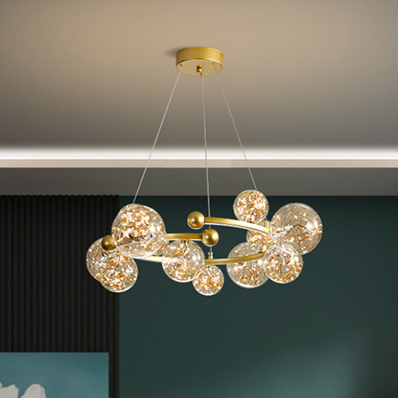 Clear Glass Orb Chandelier Lamp Contemporary LED Down Lighting with Glowing String 12 Gold Clearhalo 'Ceiling Lights' 'Chandeliers' 'Glass shade' 'Glass' 'Modern Chandeliers' 'Modern' Lighting' 2025911