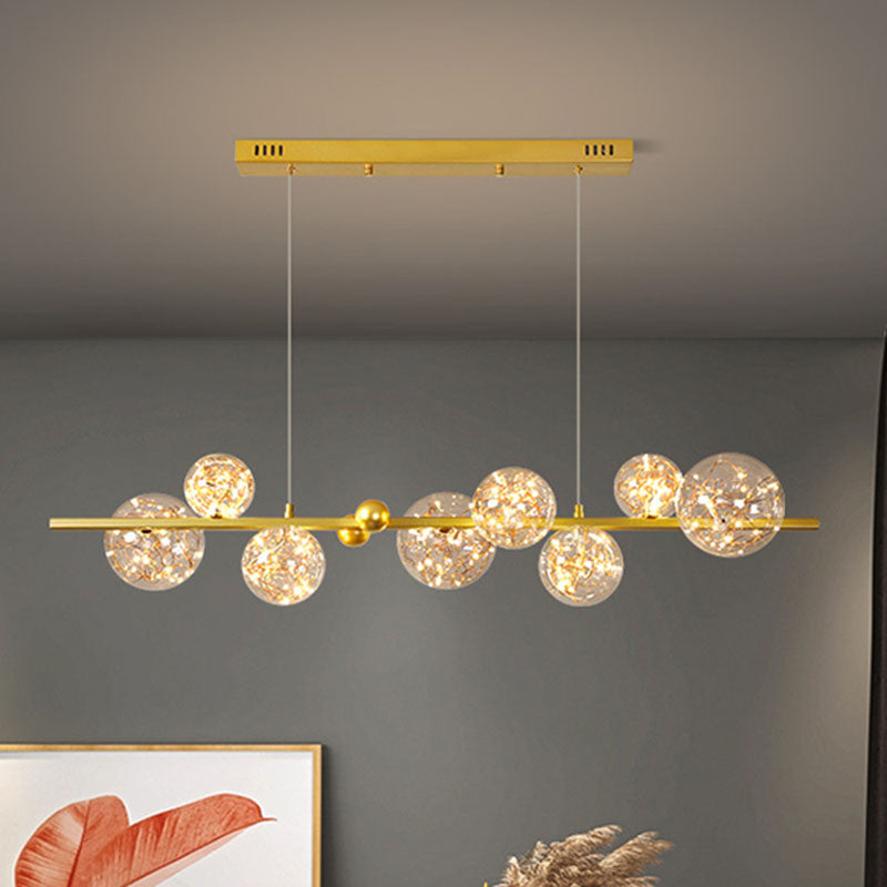 Clear Glass Orb Chandelier Lamp Contemporary LED Down Lighting with Glowing String 8 Gold Clearhalo 'Ceiling Lights' 'Chandeliers' 'Glass shade' 'Glass' 'Modern Chandeliers' 'Modern' Lighting' 2025912